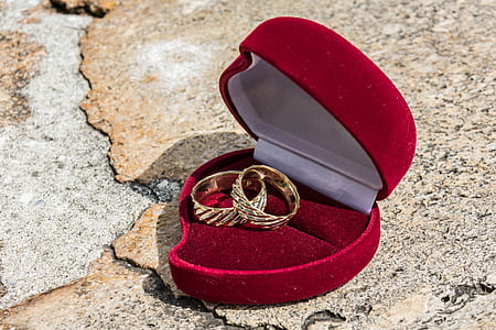 open wedding band box with rings thumbnail