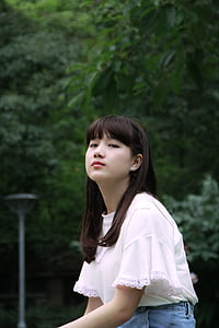 woman wearing white crew-neck top thumbnail