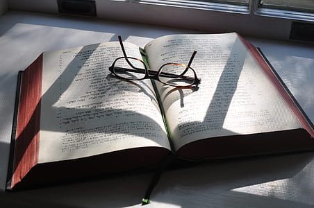 open book and eyeglasses thumbnail