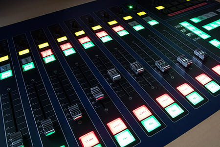 closeup photo of black and blue mixing console thumbnail
