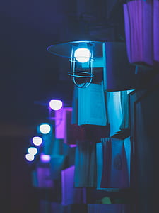 turned on white and black outdoor sconce thumbnail