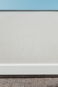 gray concrete wall at daytime thumbnail
