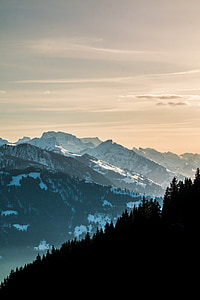 top view of mountain covered with snow during sunset thumbnail