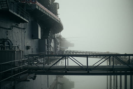 grayscale photo of black metal bridge thumbnail