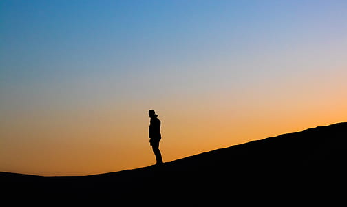 silhouette of man standing thumbnail