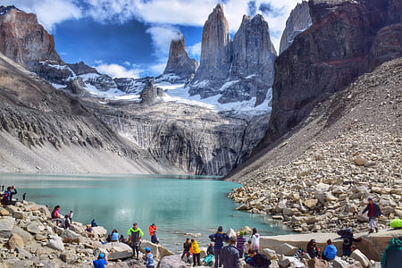 people enjoying beside body of water thumbnail