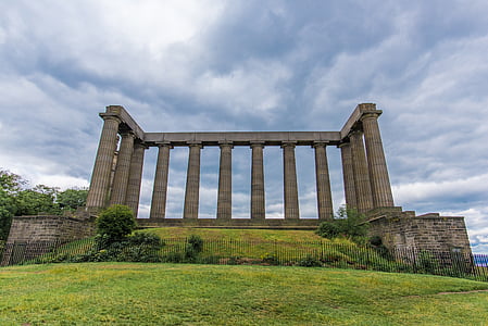 low angle photography of gray concrete pillars thumbnail