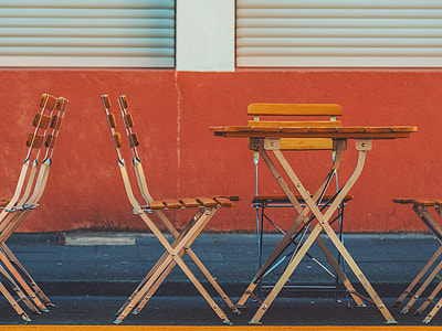 brown wooden chairs and tables thumbnail