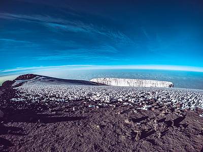 landscape photography of mountain top with clouds as background thumbnail