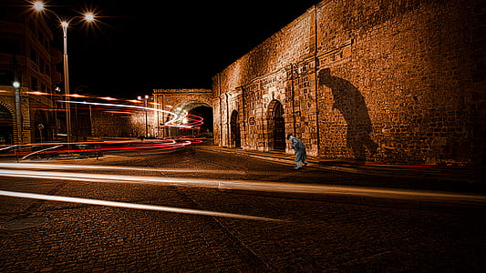 Brown Concrete Wall during Night Time Photo thumbnail
