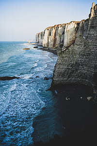 body of water splashing on mountain thumbnail