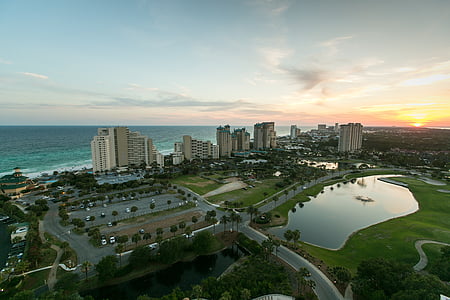 aerial photography of buildings near ocean thumbnail