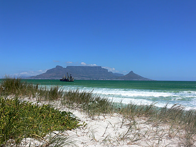 seashore beside mountian thumbnail