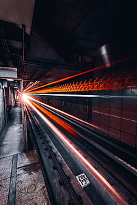 time lapse photo of train in train station thumbnail