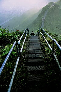 man walking on stair of mountain thumbnail