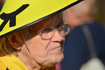 selective focus photography of woman wearing eyeglasses thumbnail