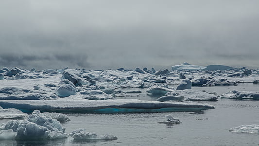 snowy island under white sky thumbnail