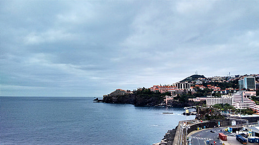 Coastline landscape and city in Funchal, Portugal thumbnail