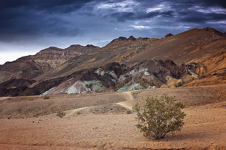 mountains under nimbus clouds thumbnail