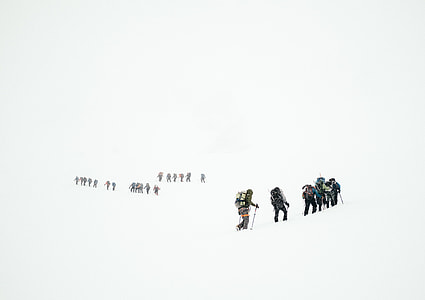 photo of people walking on area field with snow thumbnail