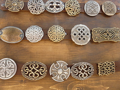 assorted-color emblem on brown wooden board thumbnail
