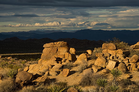 pile of rocks surrounded by grass thumbnail