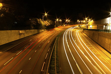 timelapse photography of vehicle on street thumbnail