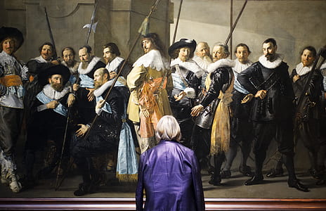 person facing on people standing beside wall painting thumbnail