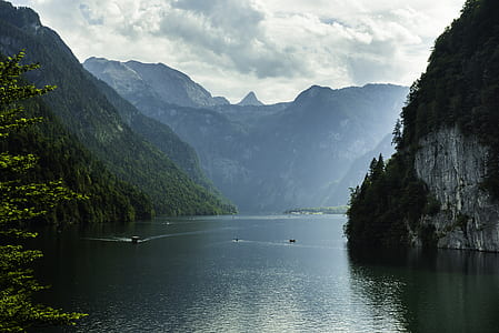 body of water near mountain thumbnail