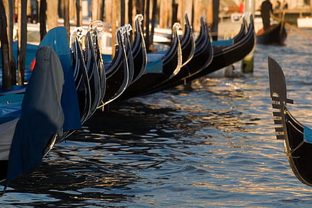 black boats on water thumbnail