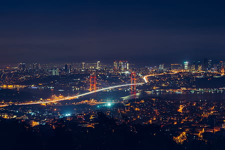 aerial view of city skyline under black sky during nighttime thumbnail