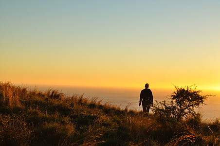 man standing near cliff thumbnail