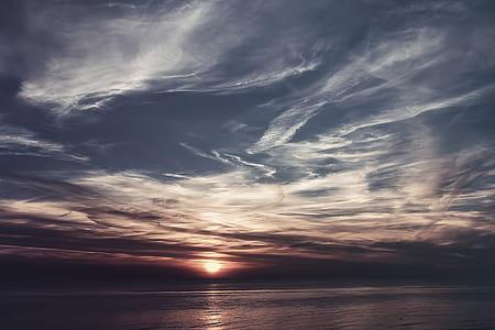 white clouds during golden hour thumbnail