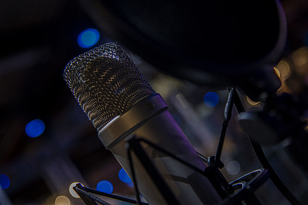 selective focus photo of gray condenser microphone thumbnail