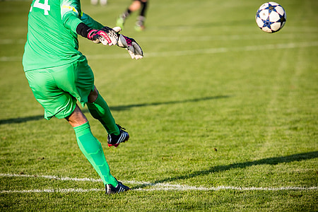 goal keeper wearing green jersey thumbnail