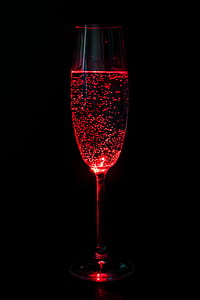 clear long-stem wine glass with red liquid thumbnail