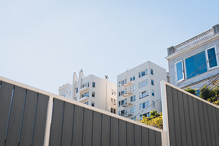 low angle photo of white concrete building thumbnail