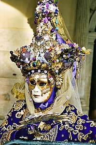 person wearing purple masquerade mask with ornaments thumbnail