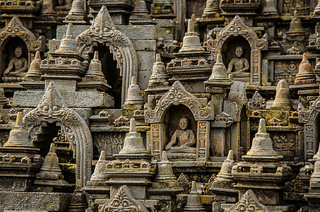 gray concrete sleeping Buddha statues thumbnail