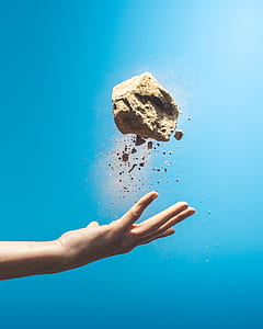 photo of person throwing stone thumbnail