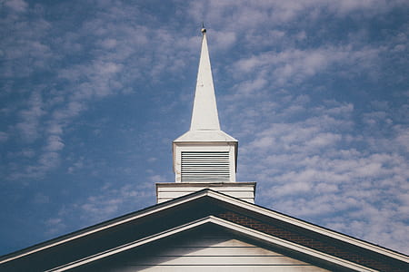 white pointed roof of house thumbnail