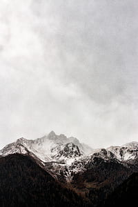 clouds on top of snow mountains thumbnail
