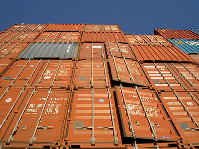 low angle photo of orange intermodal container stack at daytime thumbnail