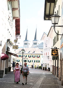 man and woman walking on street thumbnail