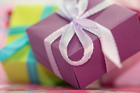 selective focus photography of purple gift box thumbnail