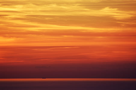 landscape photo of body of water in golden hour thumbnail