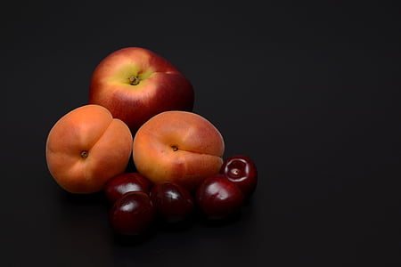 Apples and orange fruit with black background thumbnail