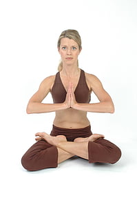 woman with brown yoga suit doing lotus position thumbnail