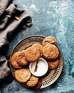 brown cookies on brass plate thumbnail