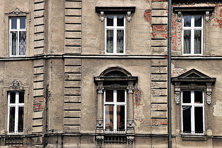 photo of brown concrete building during daytime thumbnail